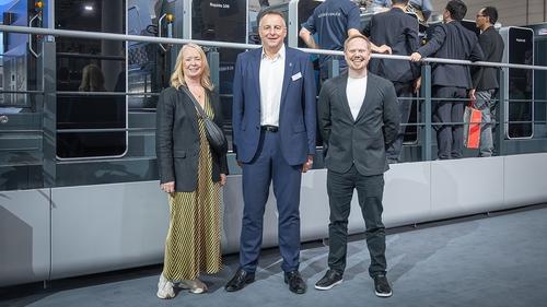 Photo 1: Lisa Smith, Chris Scully and Marcus Short in front of Rapida 106 X