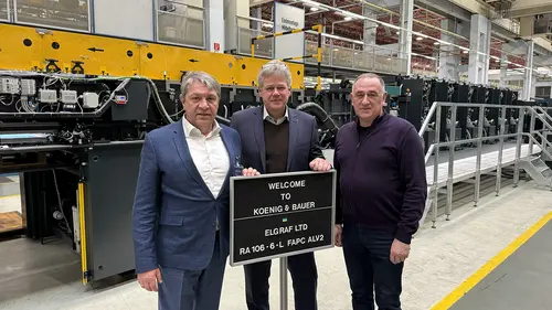 Igor Levin, head of the board of directors of Elgraf, Michael König, senior sales manager for Koenig & Bauer, and Elgraf marketing director Volodymyr Boitsun